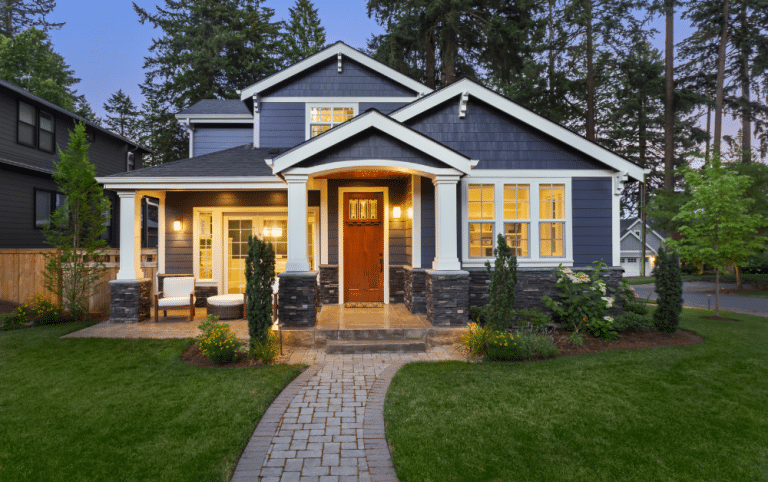 Blue House with Brown Doors and White Windows